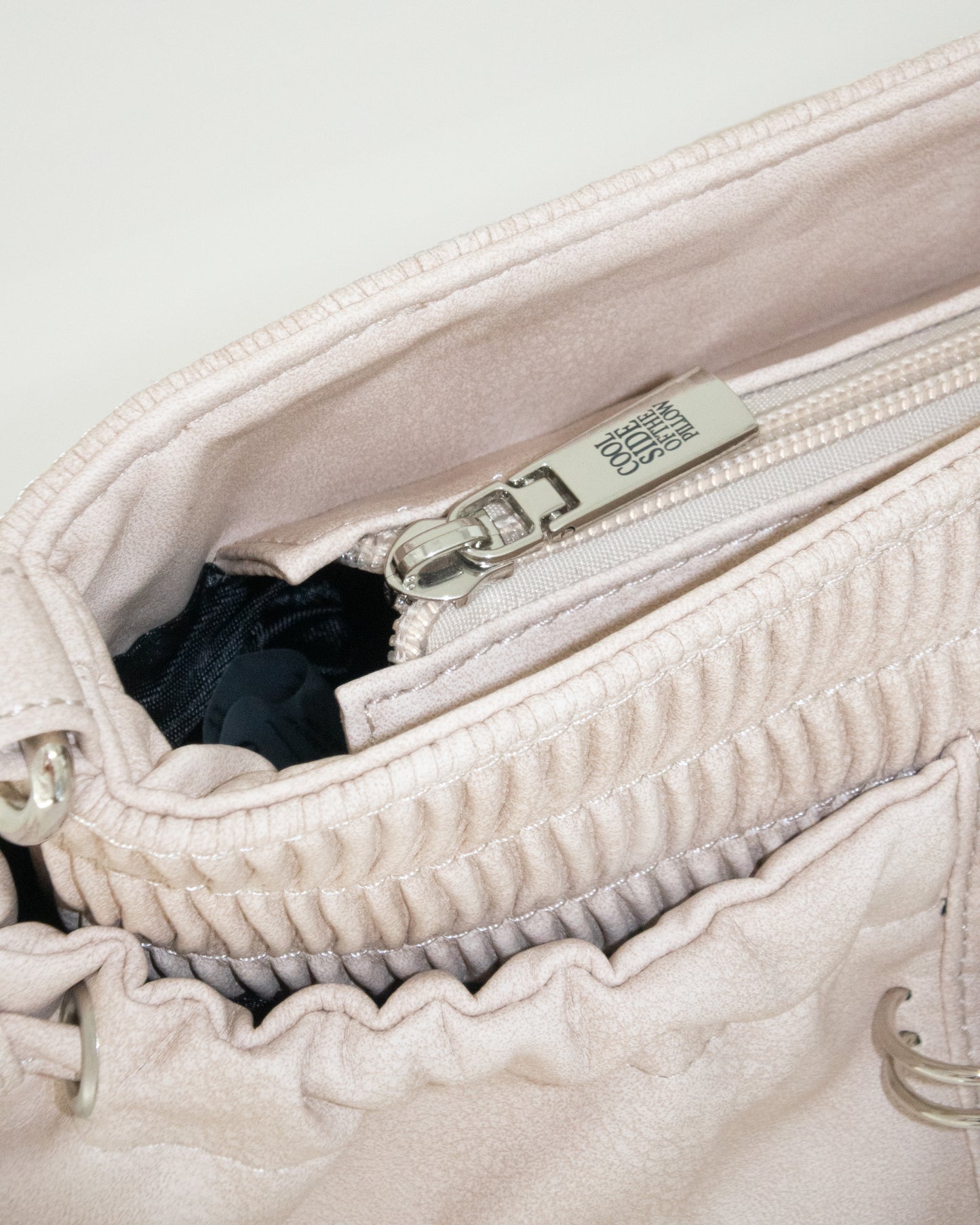 PIERCED BOXER BAG sand