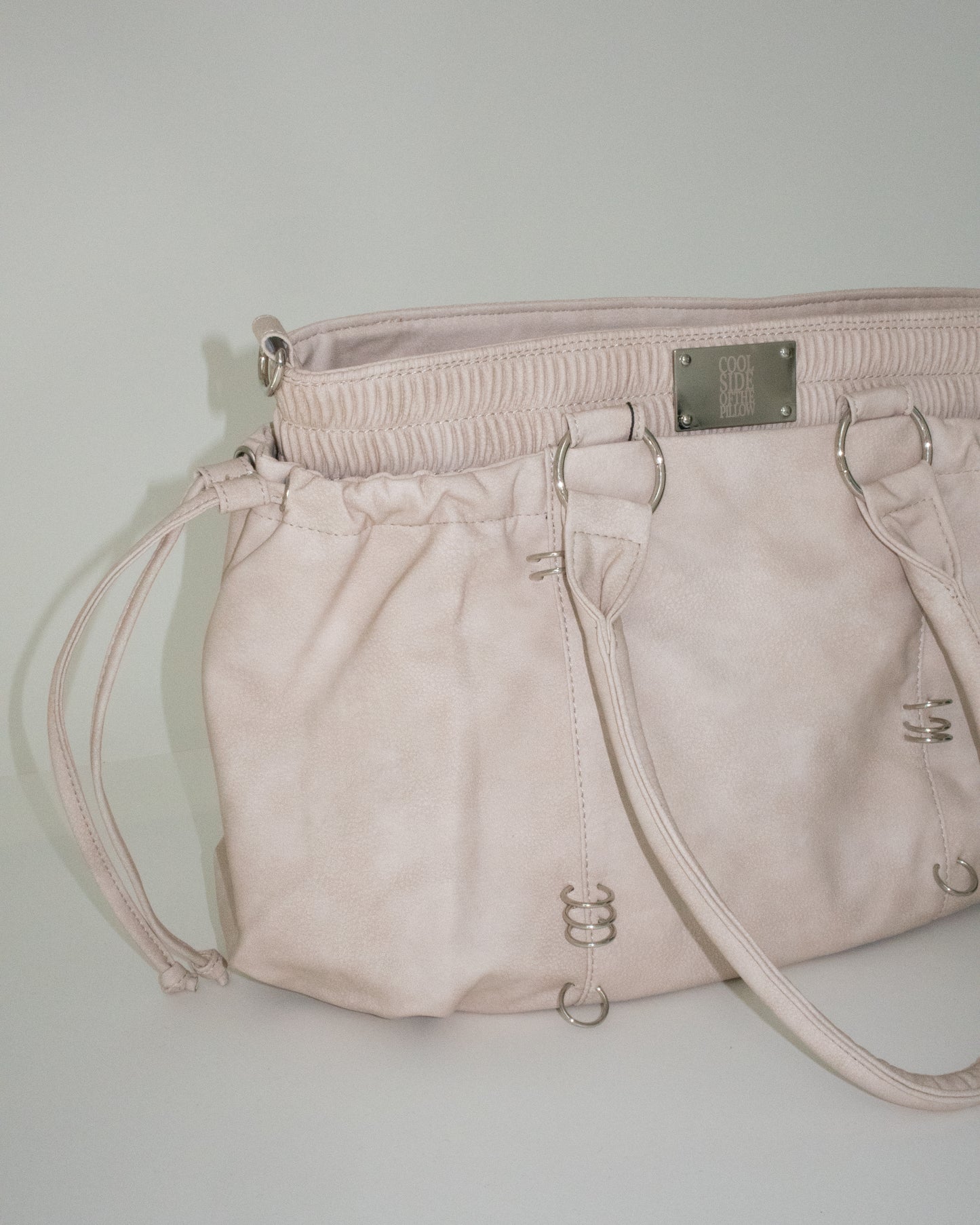 PIERCED BOXER BAG sand