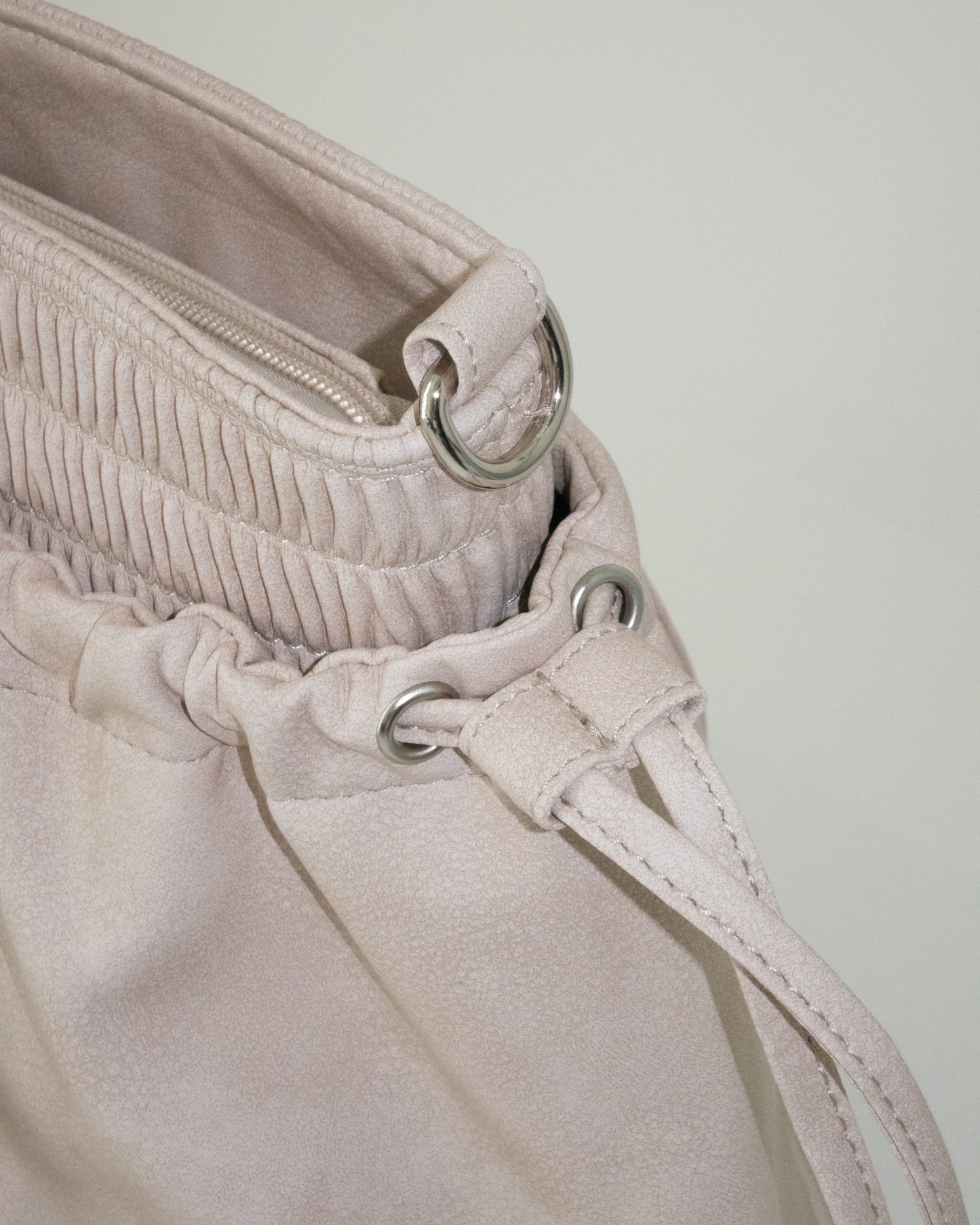 PIERCED BOXER BAG sand