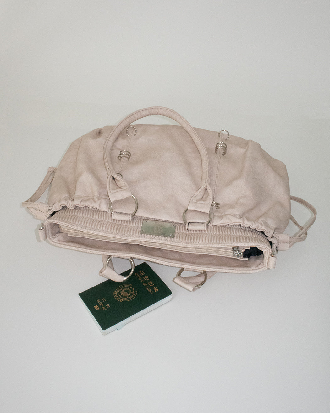 PIERCED BOXER BAG sand