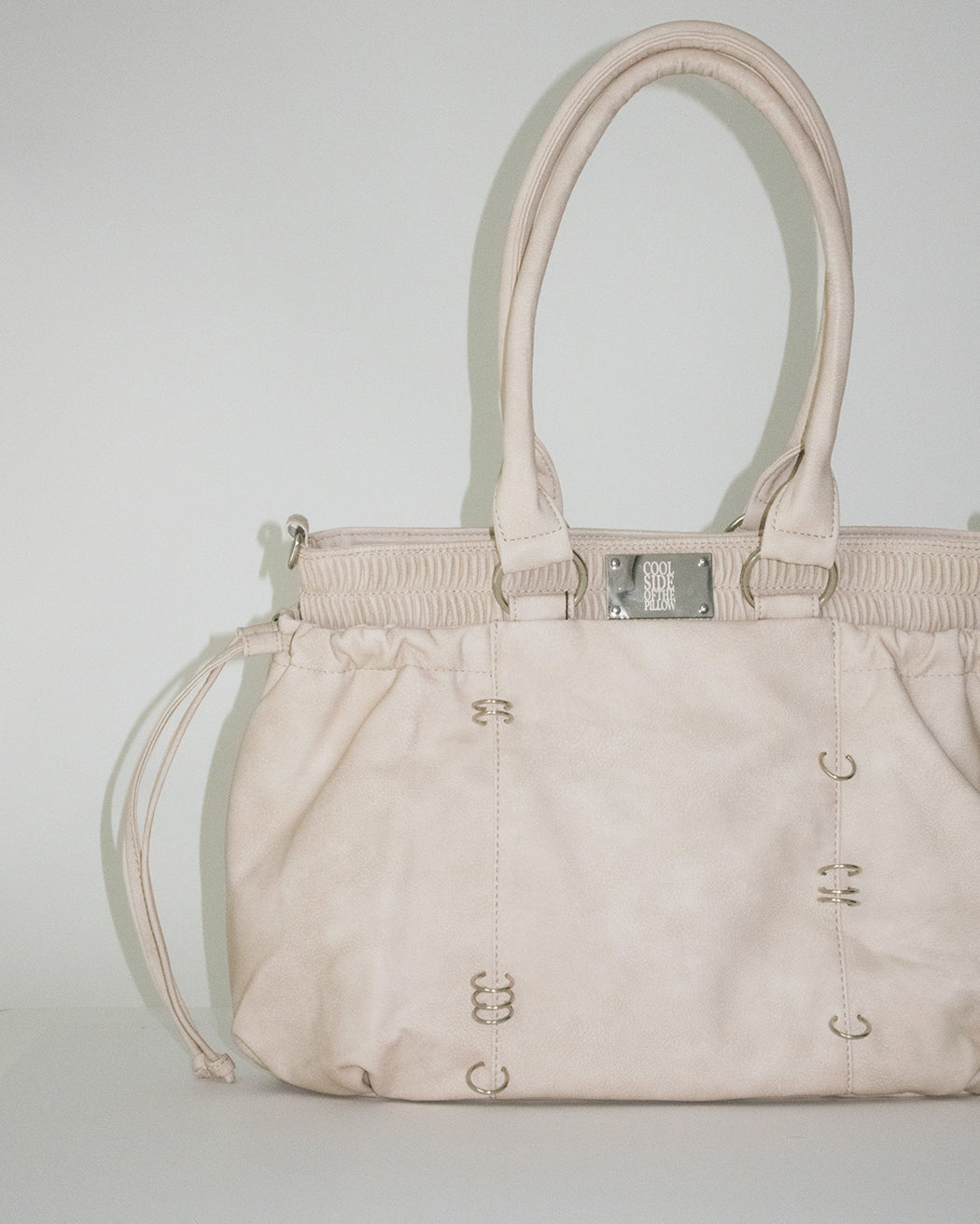 PIERCED BOXER BAG sand