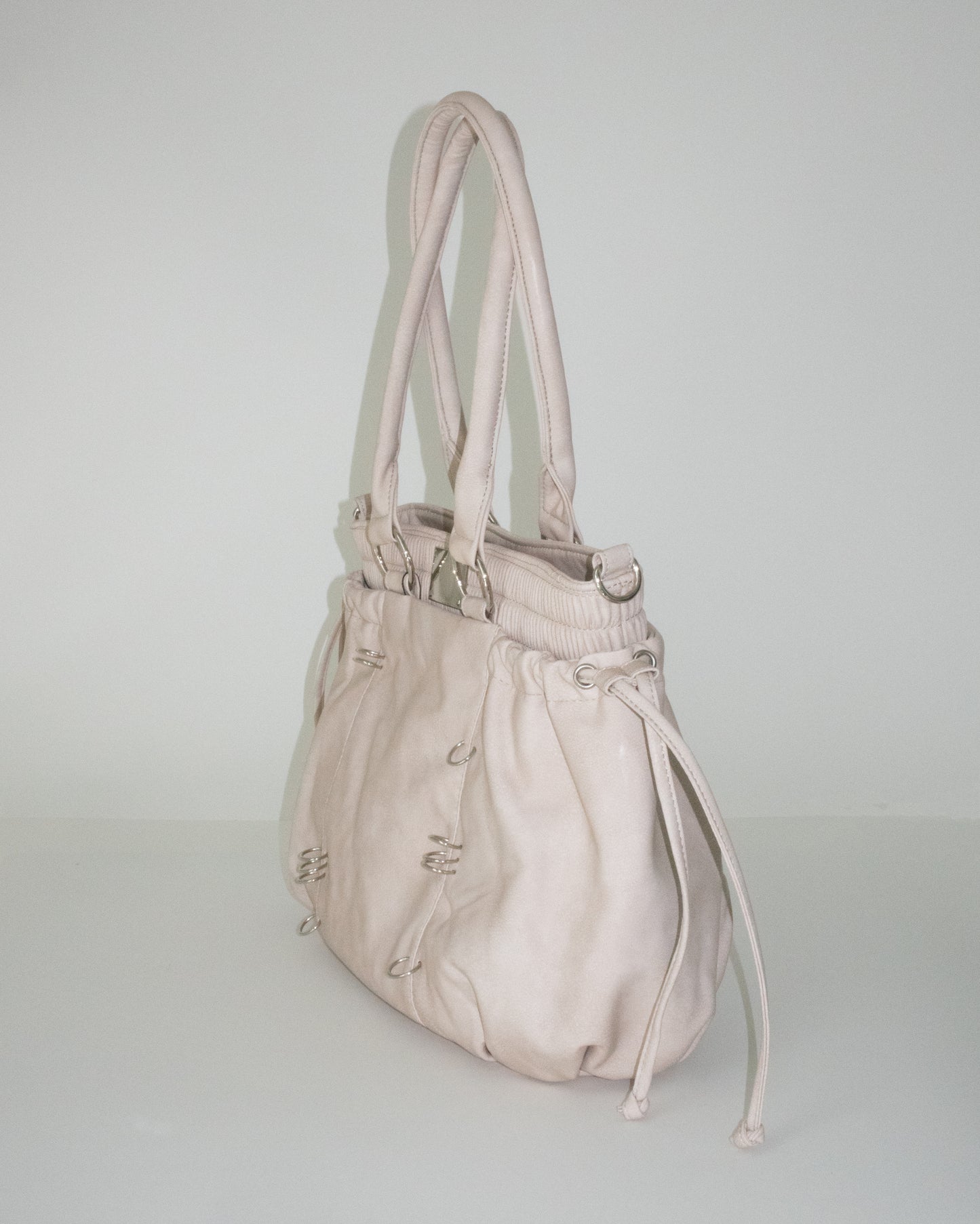 PIERCED BOXER BAG sand