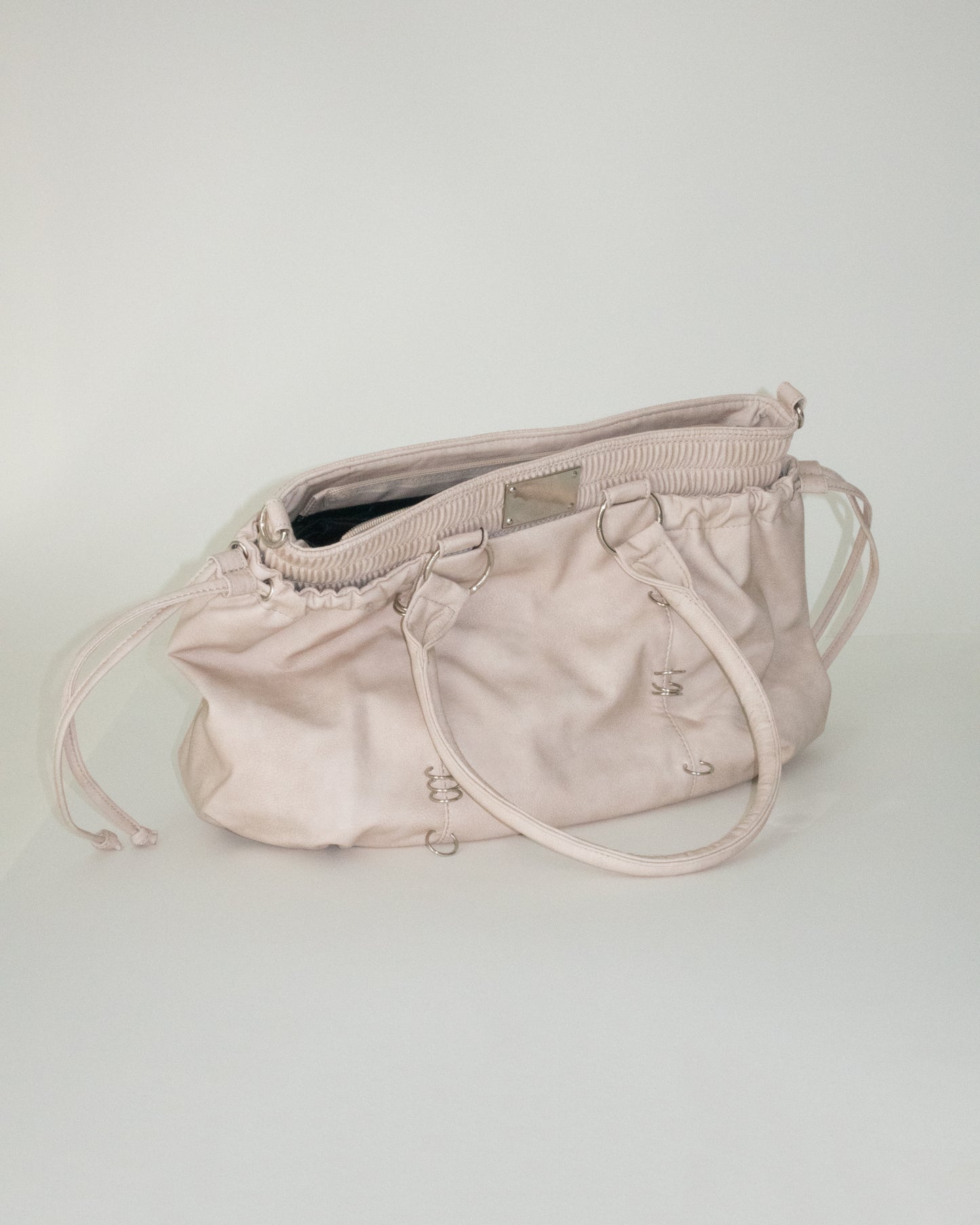 PIERCED BOXER BAG sand