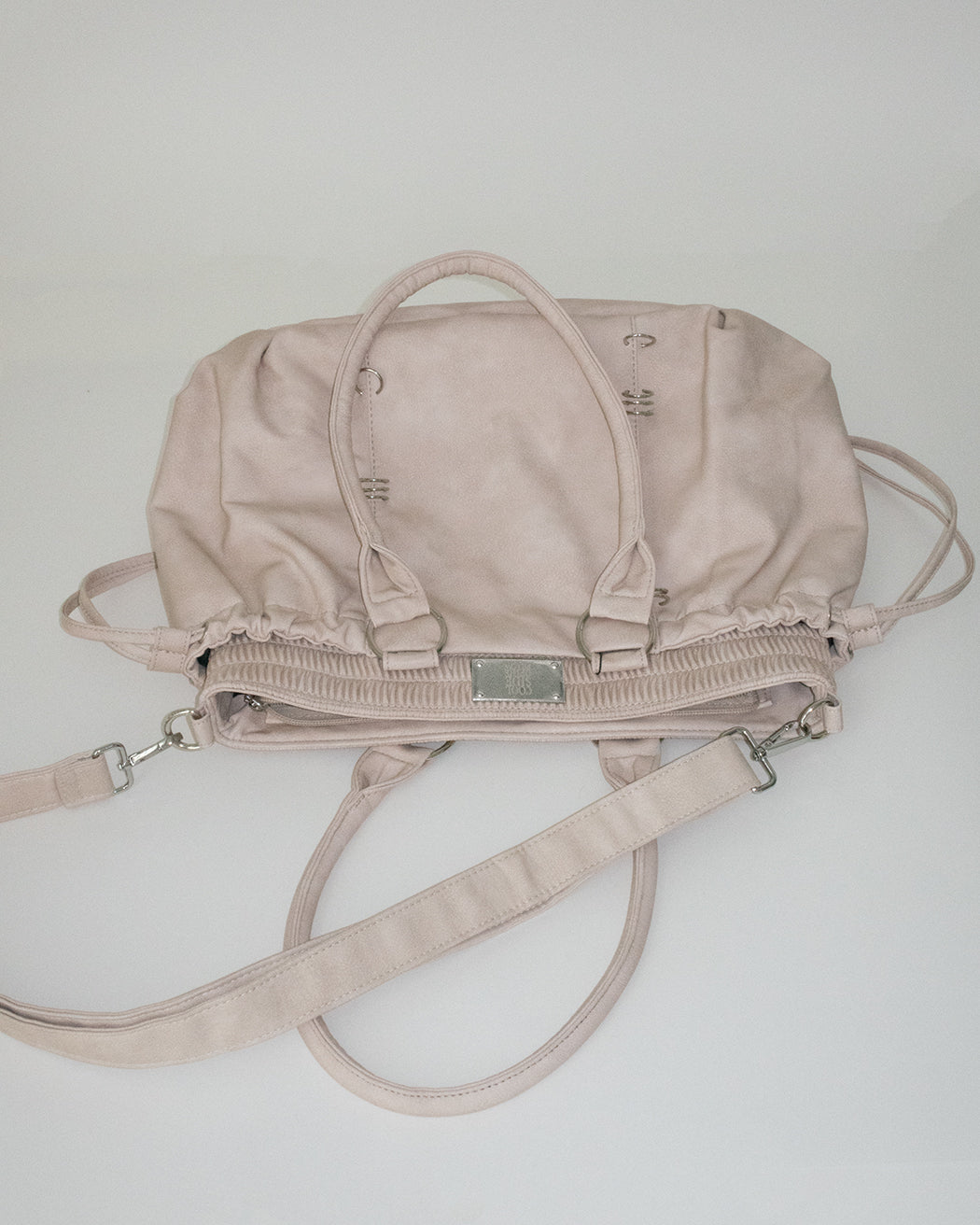 PIERCED BOXER BAG sand