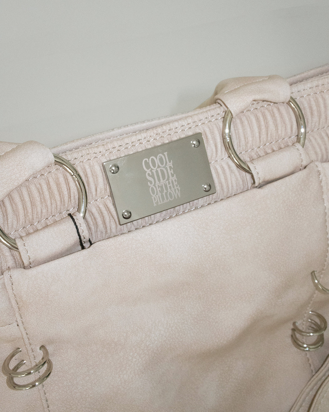 PIERCED BOXER BAG sand