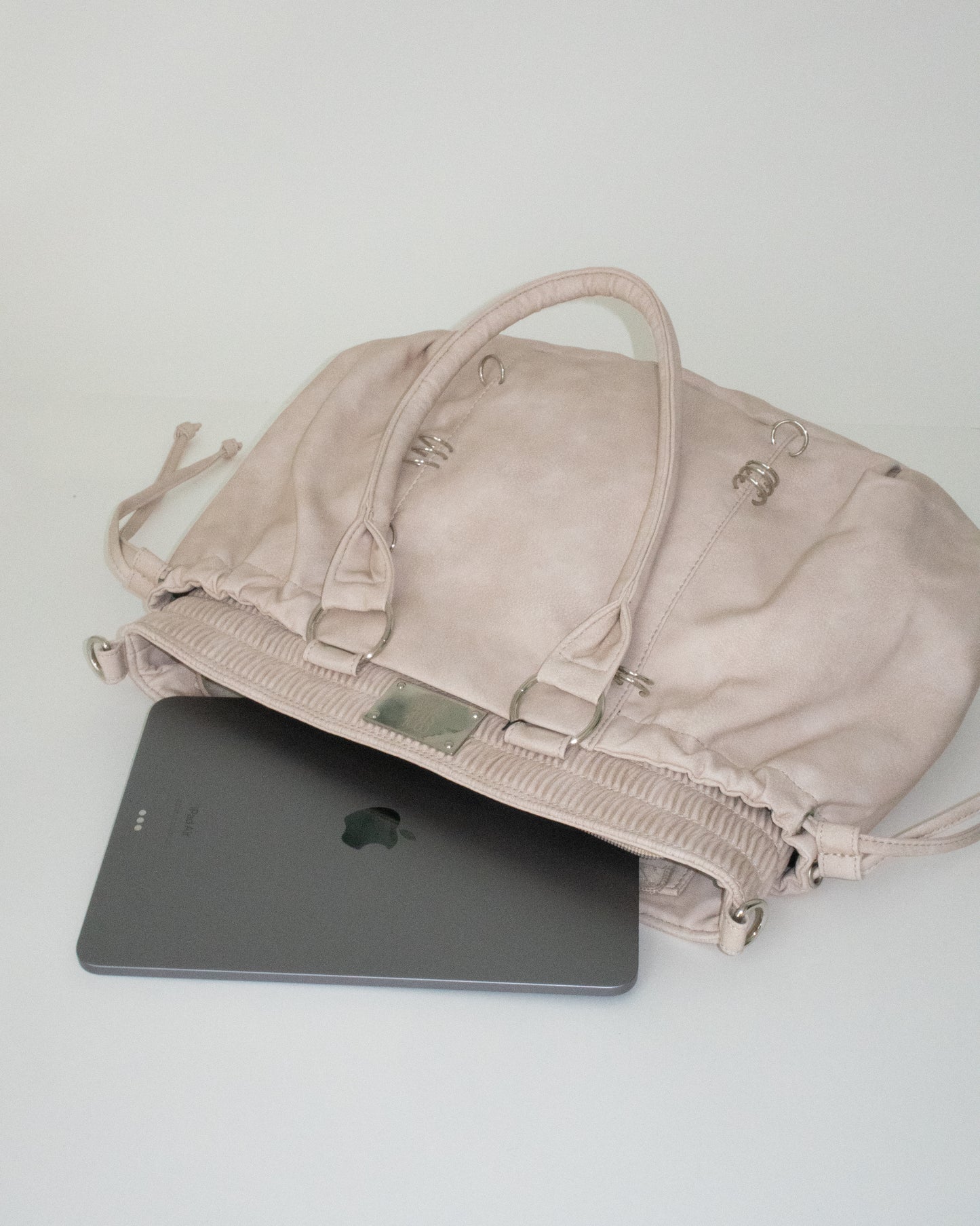PIERCED BOXER BAG sand