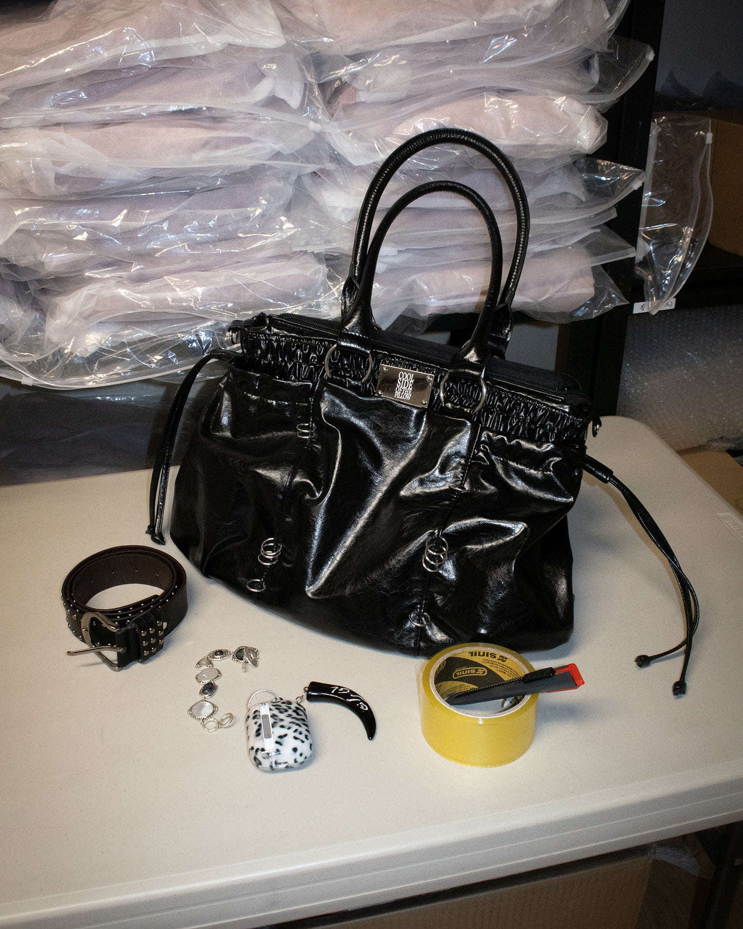 PIERCED BOXER BAG black
