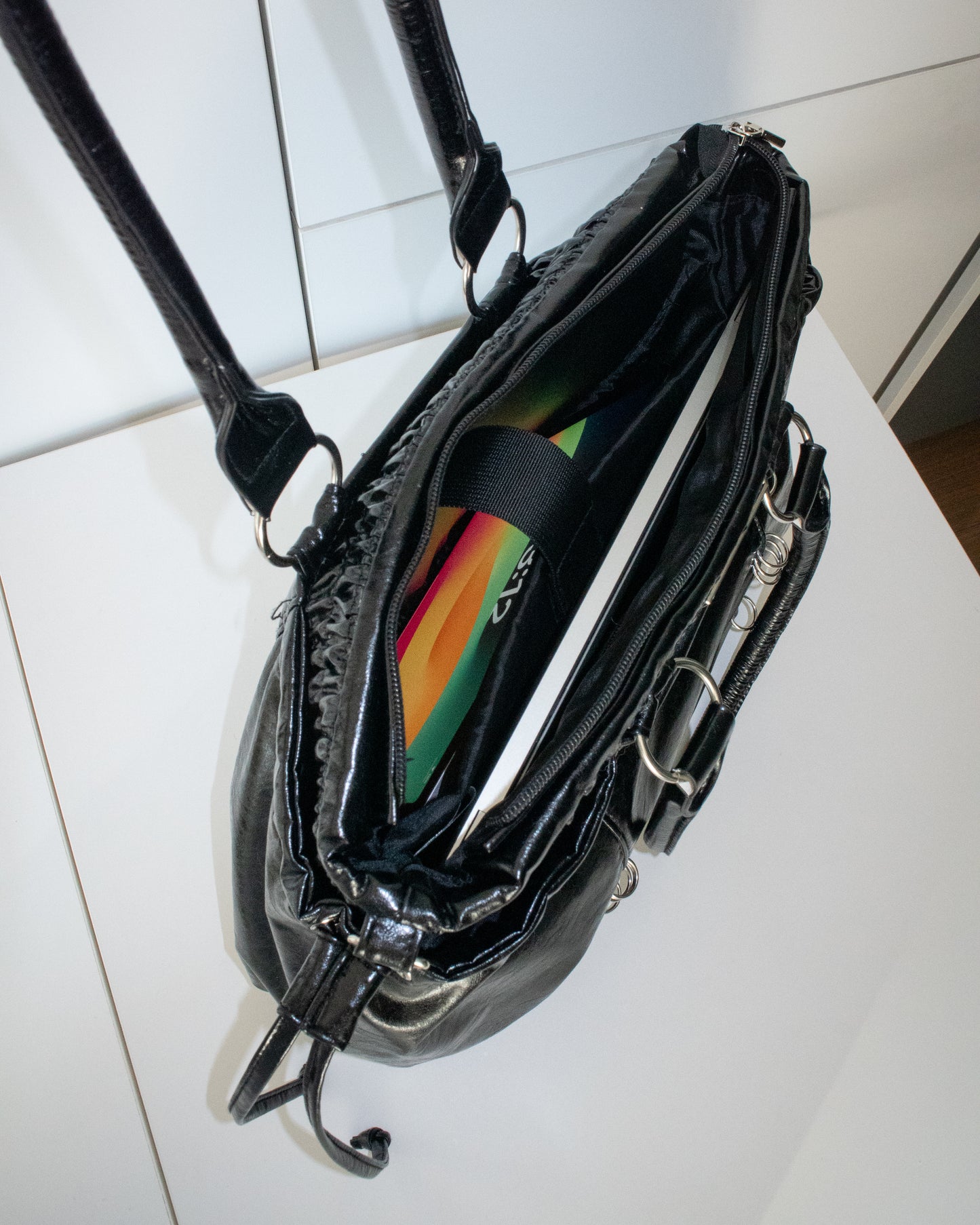 PIERCED BOXER BAG black