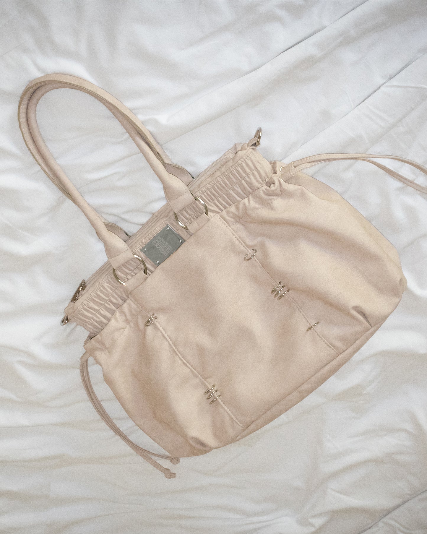 PIERCED BOXER BAG sand
