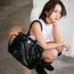 PIERCED BOXER BAG black