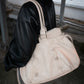 PIERCED BOXER BAG sand
