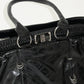 PIERCED BOXER BAG black