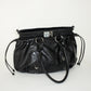 PIERCED BOXER BAG black