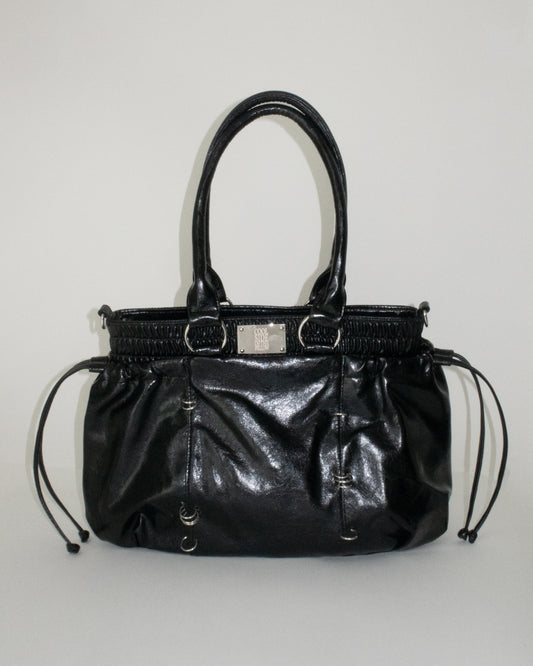 PIERCED BOXER BAG black